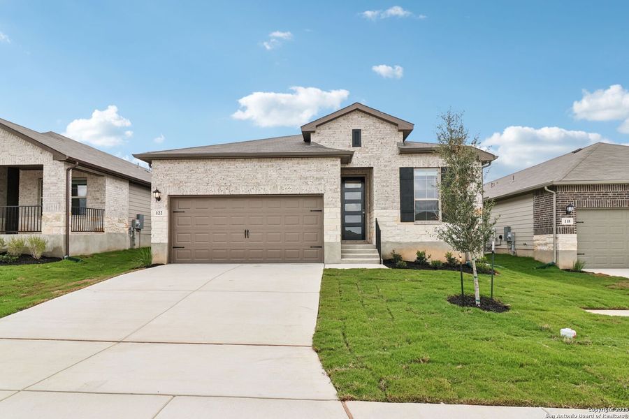 Front exterior of a new home in , Cibolo, TX, highlighting curb appeal (Image 19). Front exterior of a new home in , Cibolo, TX, highlighting curb appeal (Image 19).