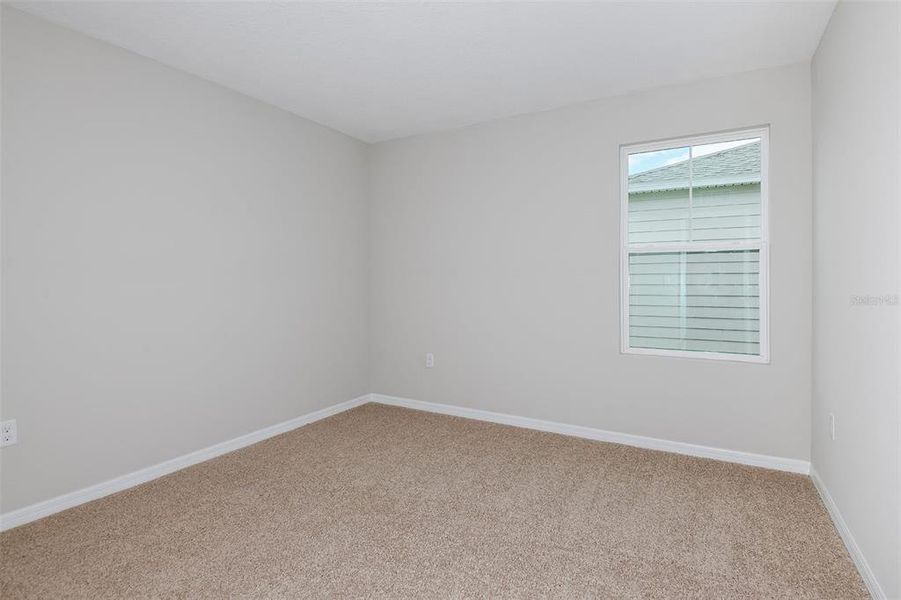Spacious, unfurnished interior of a new home in Pasadena Ridge, Dade City (Image 15).