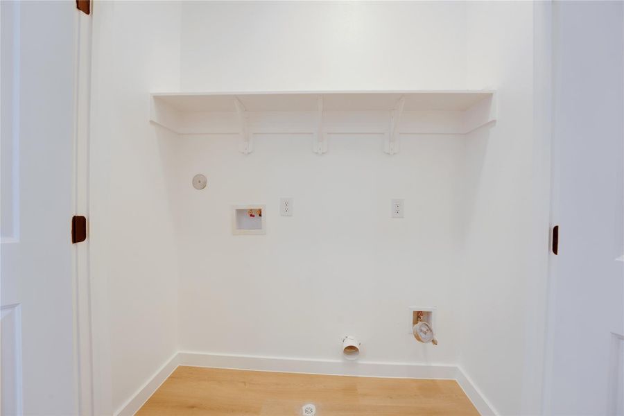 Laundry nook with shelving
