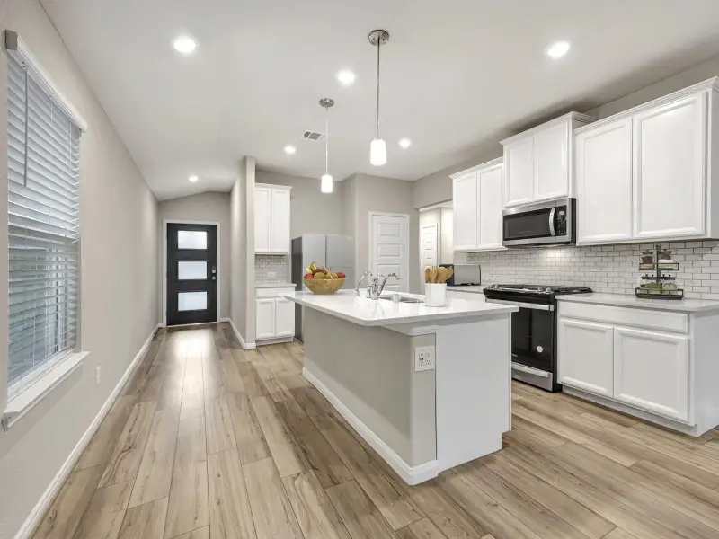 Furnished interior view inside a new home in , Conroe (Image 10).
