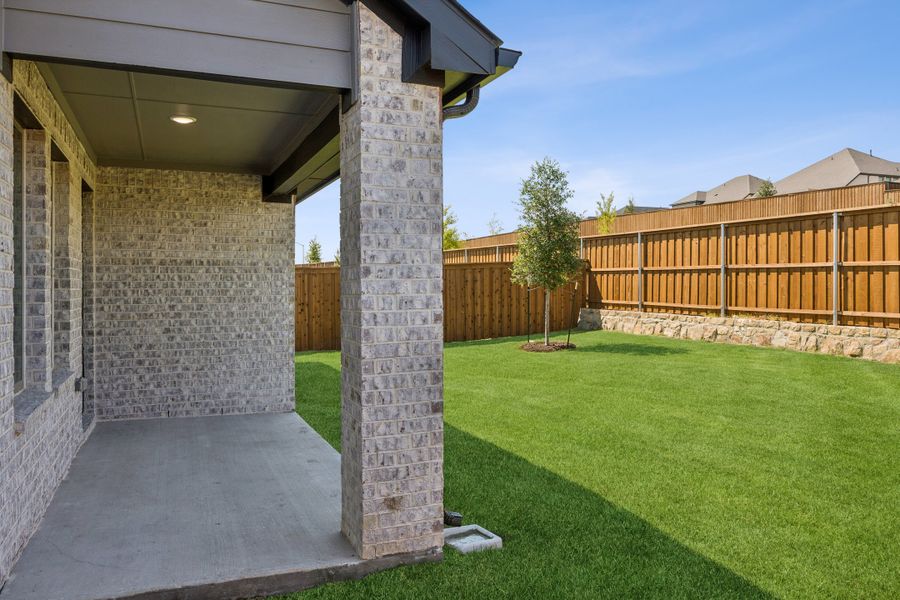 Patio in the Oscar home plan by Trophy Signature Homes – REPRESENTATIVE PHOTO Patio in the Oscar home plan by Trophy Signature Homes – REPRESENTATIVE PHOTO