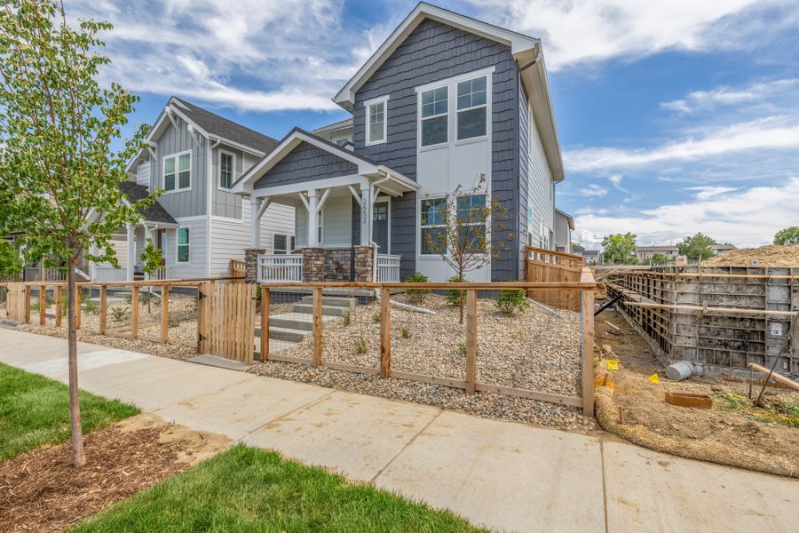 Front exterior of a new home in Arras Park, Thornton, CO, highlighting curb appeal (Image 23).