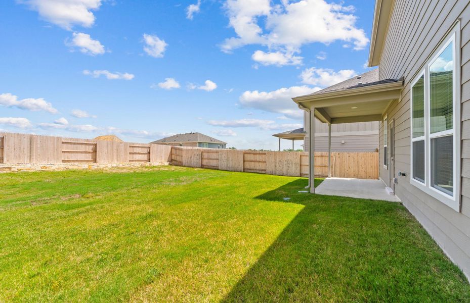 Exterior details and patio area of a home in Patterson Ranch, Georgetown (Image 20).