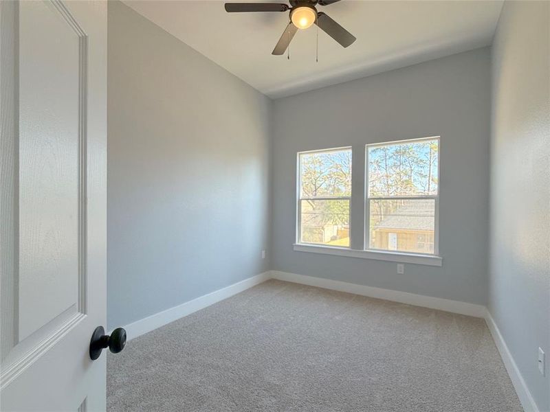 Luxurious master suite featuring a stunning bath and spacious walk-in closet.