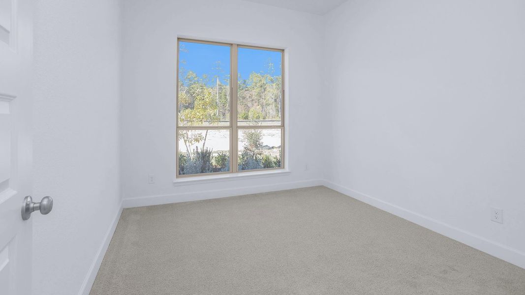 Spacious, unfurnished interior of a new home in Artavia 45', Conroe (Image 12).