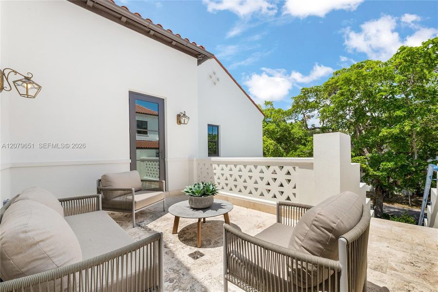 Exterior details and patio area of a home in , Coral Gables (Image 23).