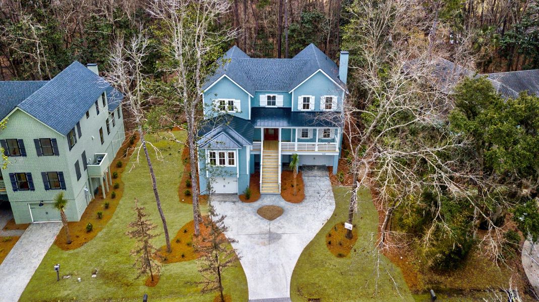 Front exterior of a new home in , Johns Island, SC, highlighting curb appeal (Image 1). Front exterior of a new home in , Johns Island, SC, highlighting curb appeal (Image 1).