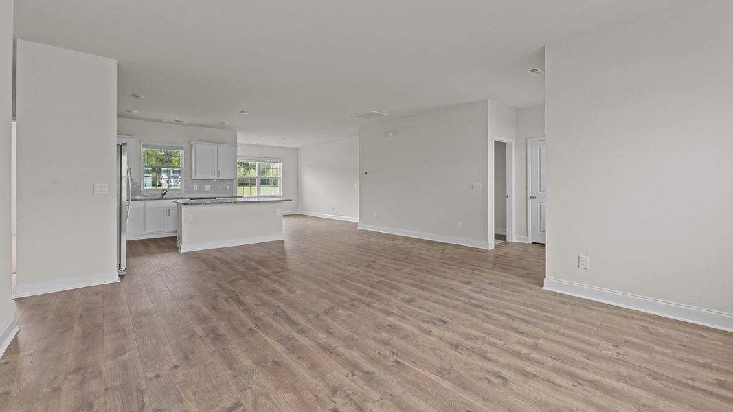 Representative unfurnished interior of a home built from the Mills by D.R. Horton in Tyler - Home on the Lake, New Bern (Image 9).