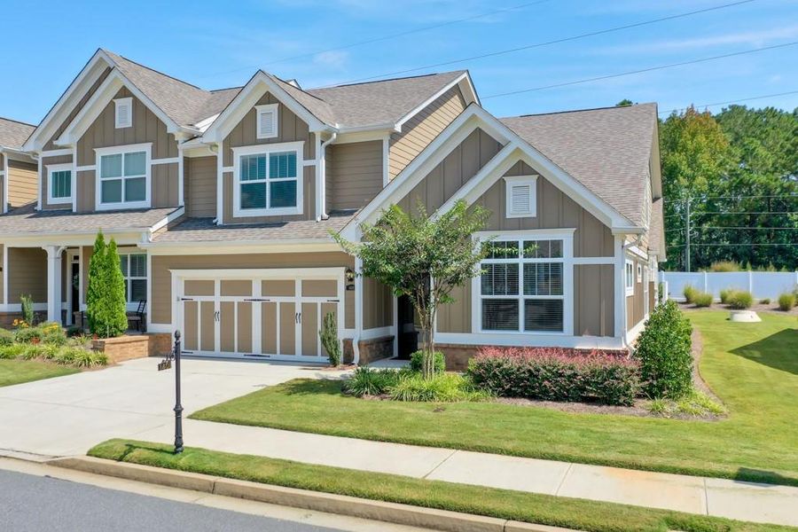 Front exterior of a new home in , Cumming, GA, highlighting curb appeal (Image 25).