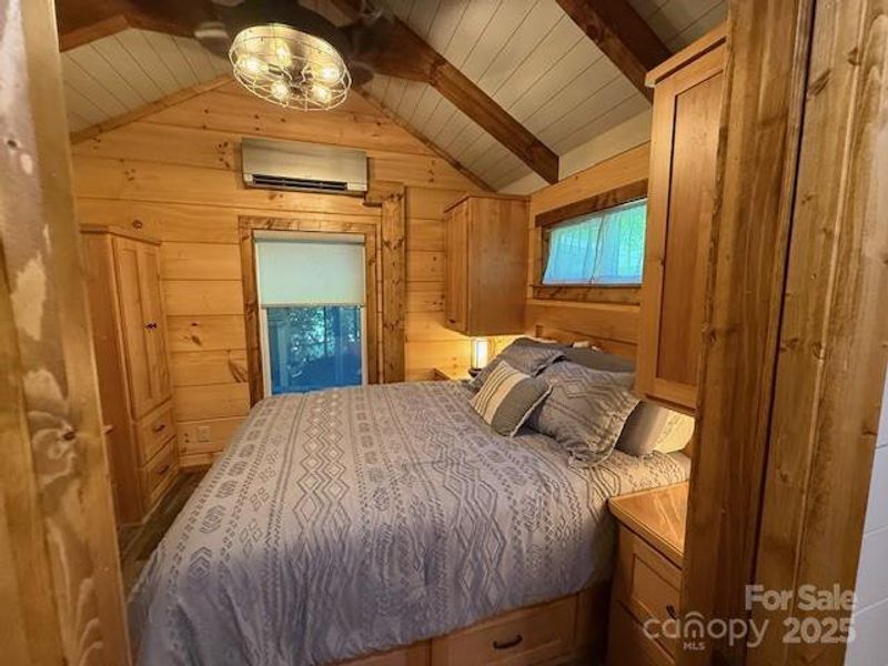 Primary bedroom with lots of built ins