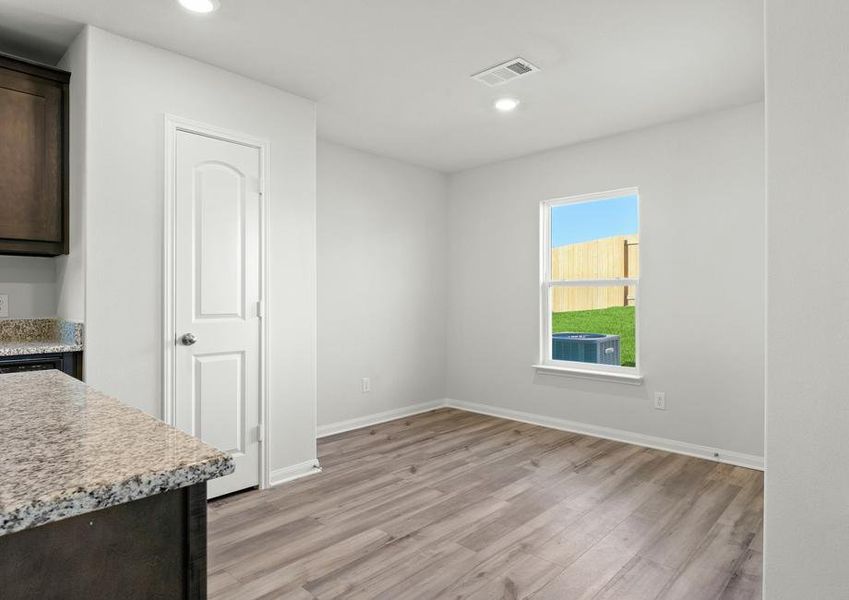 The dining room of the Blanco sits right off of the kitchen.