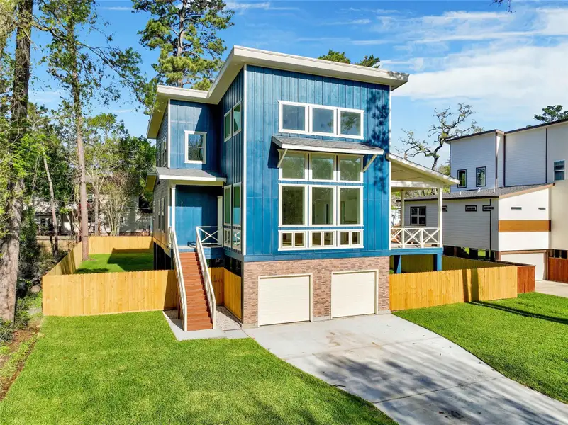 Front exterior of a new home in , Cypress, TX, highlighting curb appeal (Image 22).