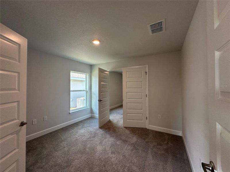 Double doors to adjoining bedroom