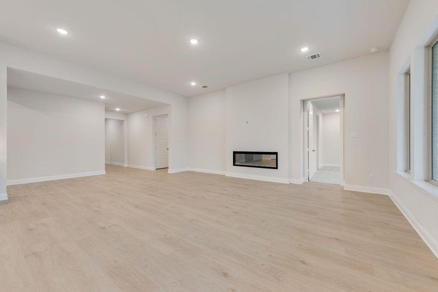 Spacious, unfurnished interior of a new home in Valencia On The Lake, Little Elm (Image 28).