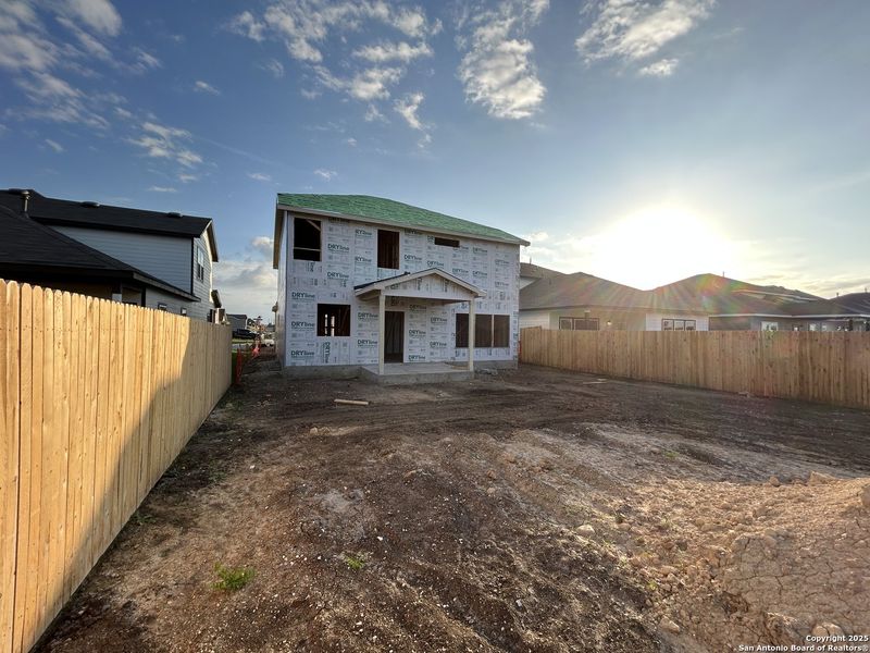 Exterior details and patio area of a home in Enclave at Hennersby Hollow 50's, San Antonio (Image 2).
