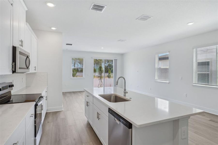 Furnished interior view inside a new home in Cyrene at Minneola - Villas, Montverde (Image 9). Furnished interior view inside a new home in Cyrene at Minneola - Villas, Montverde (Image 9).
