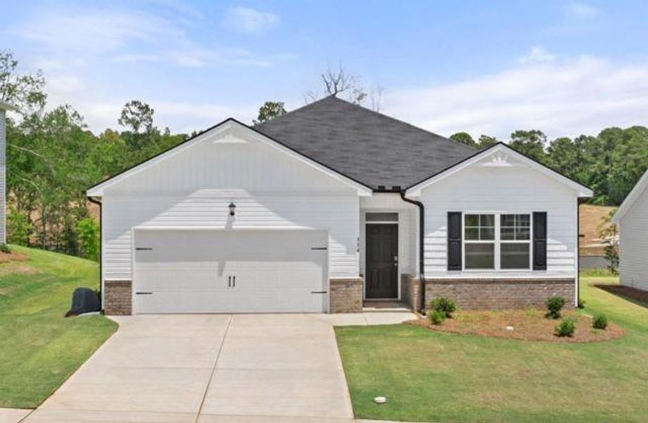 Front exterior of a new home in Poplar Preserve, Newnan, GA, highlighting curb appeal (Image 1).