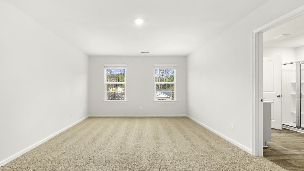 Spacious, unfurnished interior of a new home in Greystone North, Stoneville (Image 16).