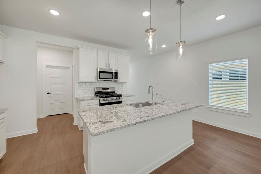 Furnished interior view inside a new home in Sorella, Tomball (Image 12).