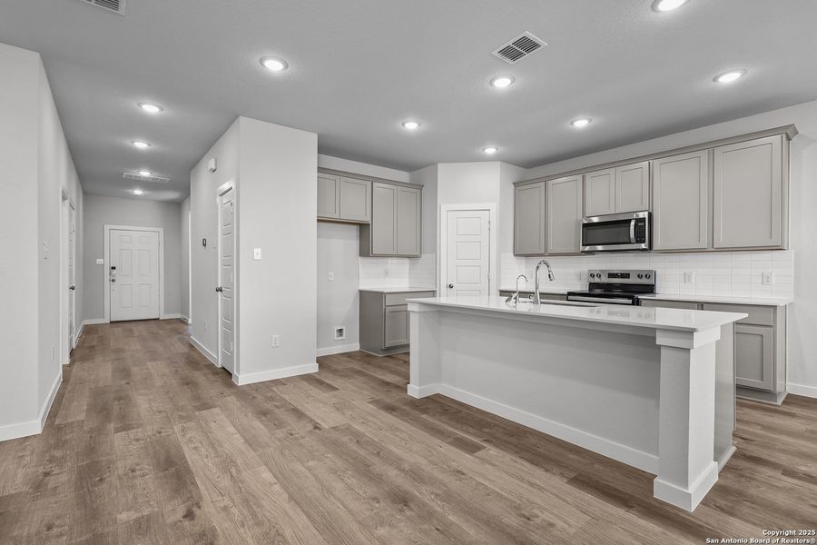 Furnished interior view inside a new home in Cinco Lakes, San Antonio (Image 11).