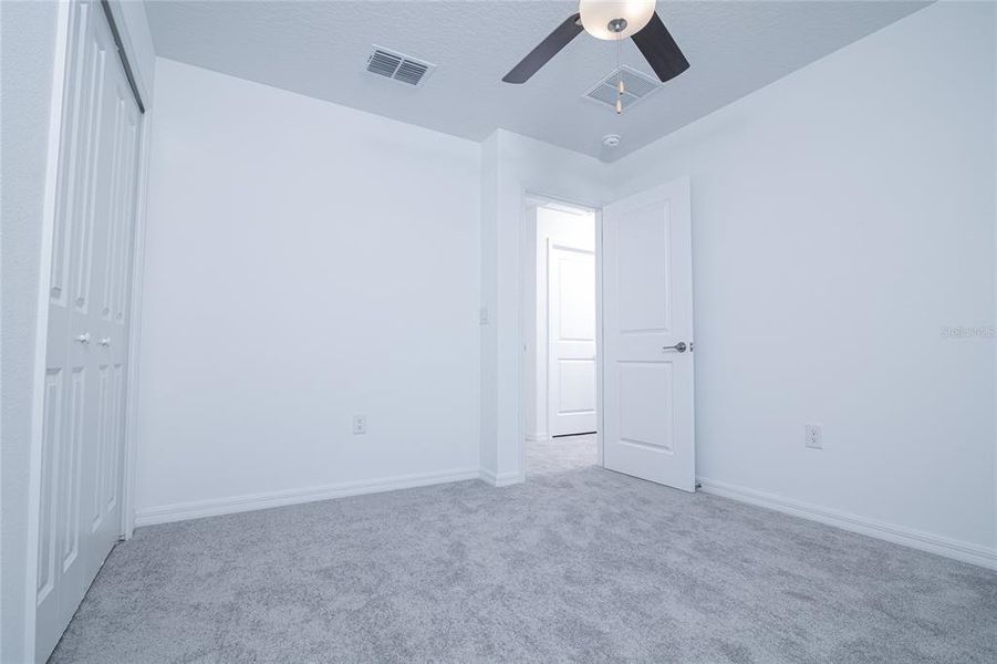 Spacious, unfurnished interior of a new home in Saddle Creek Preserve: The Manors II, Lakeland (Image 44).