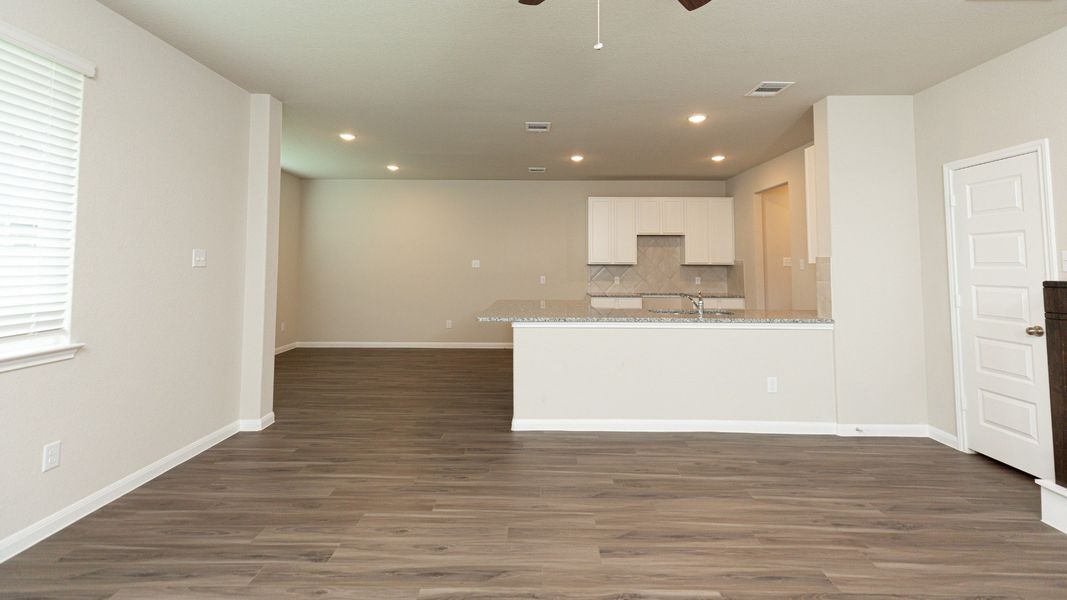 Family Room to Kitchen and Dining Area