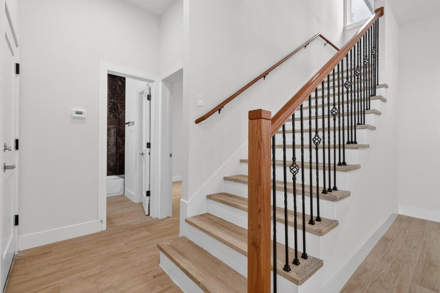 1067-Luxury Vinyl upstairs. What a match with these tiles !!!