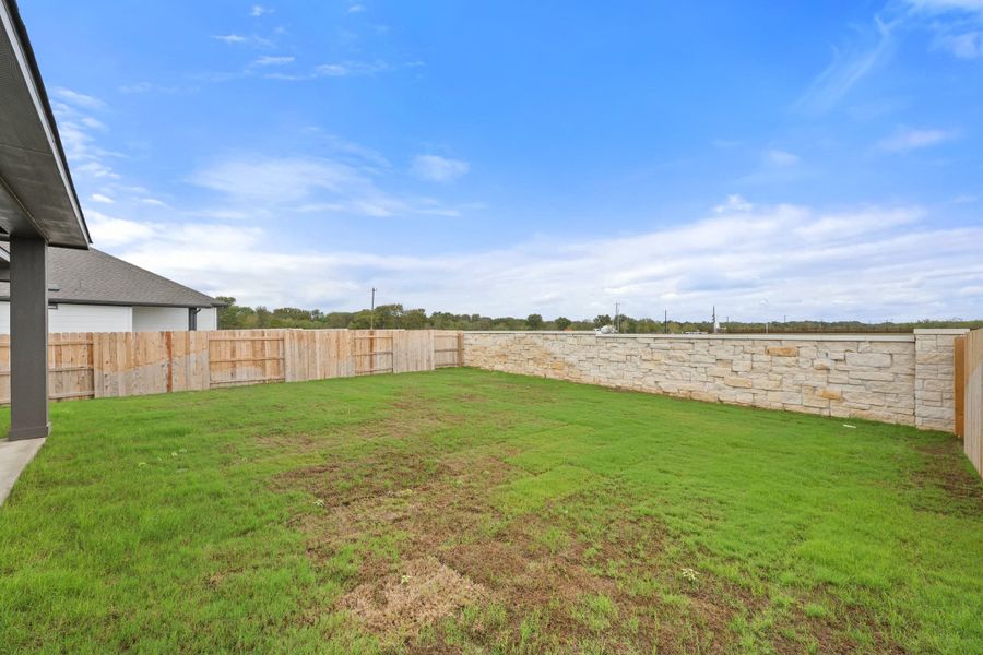 Exterior details and patio area of a home in Lagos Reserve, Manor (Image 27).