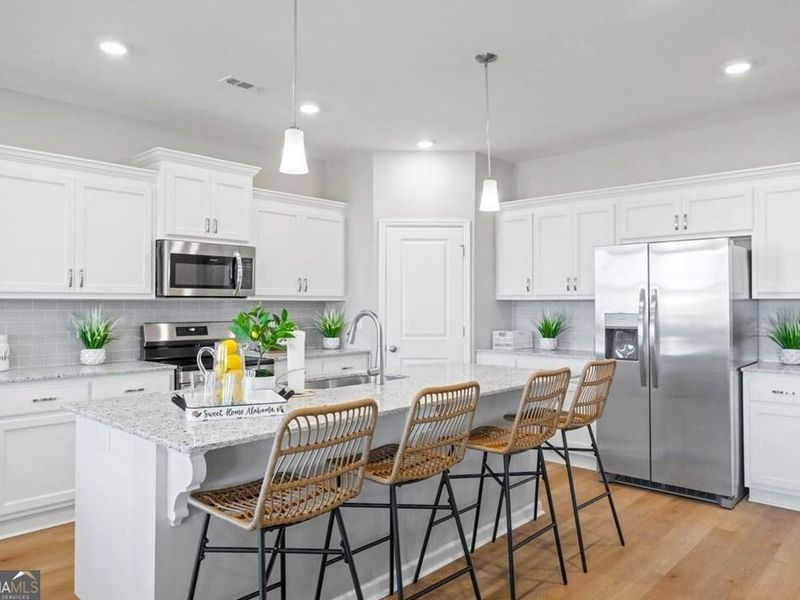 Furnished interior view inside a new home in Ivy Glen, Perry (Image 6).