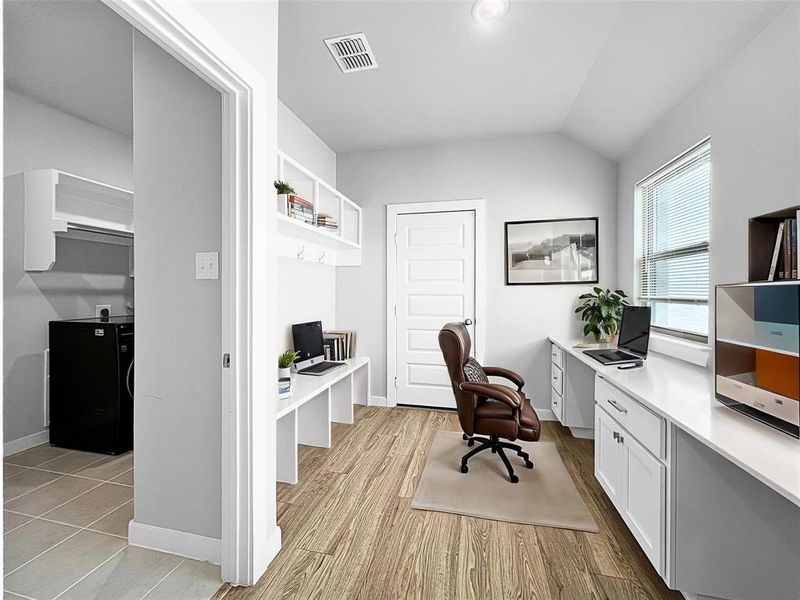 Office area with built in desk