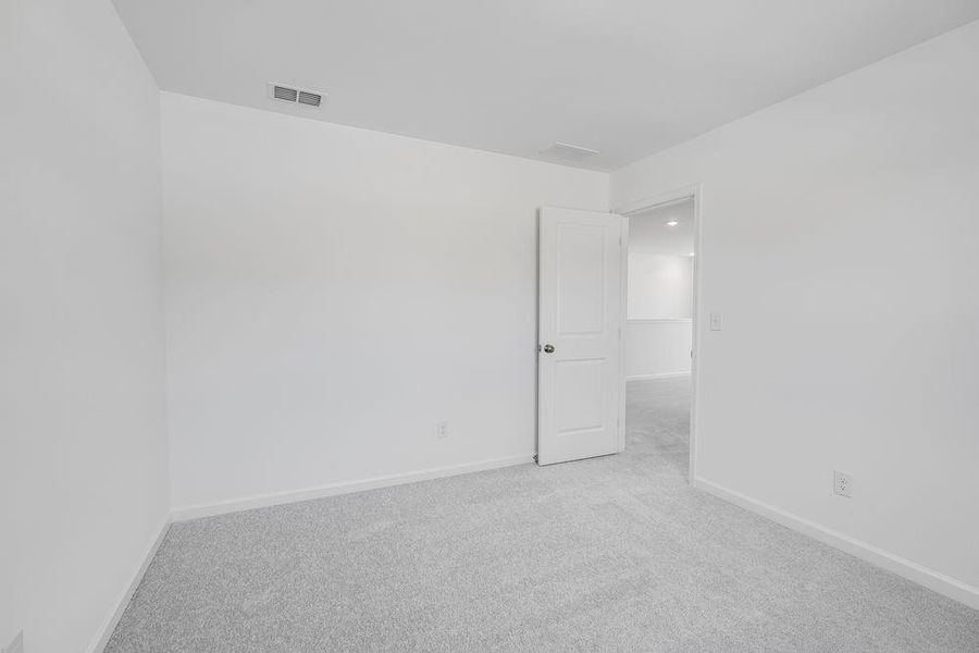 Spacious, unfurnished interior of a new home in Windance Lake, Loganville (Image 24).