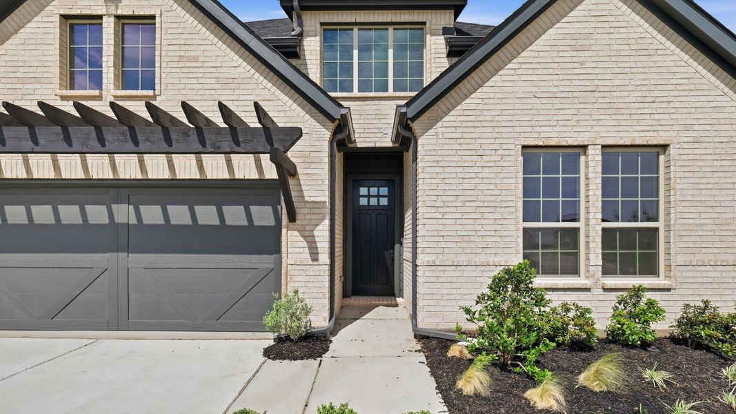 Exterior details and patio area of a home in Green Meadows Classic, Celina (Image 3). Exterior details and patio area of a home in Green Meadows Classic, Celina (Image 3).