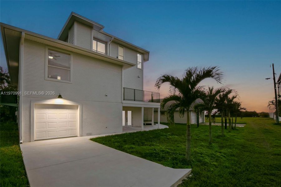Front exterior of a new home in , Crystal Beach, FL, highlighting curb appeal (Image 19).