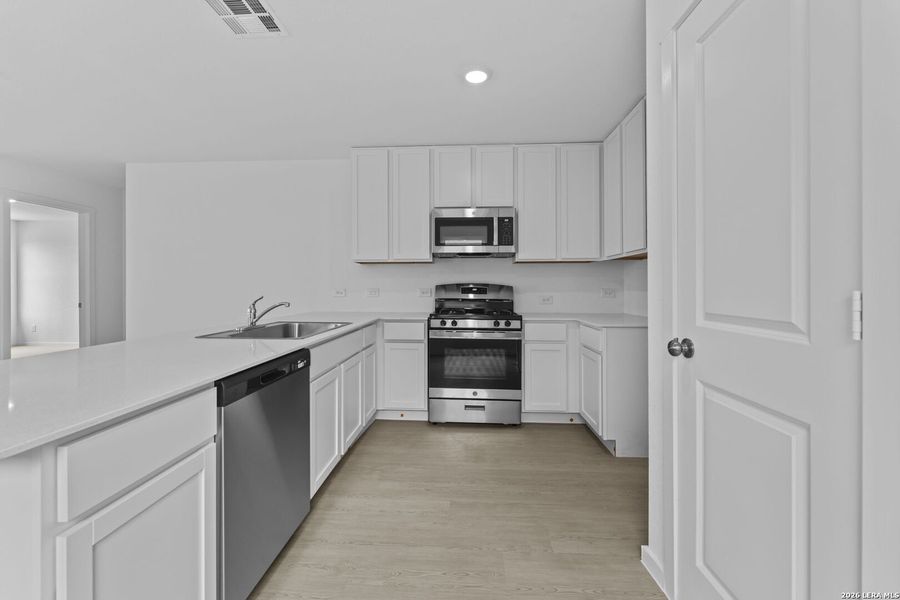 Furnished interior view inside a new home in Spring Grove, San Antonio (Image 7).