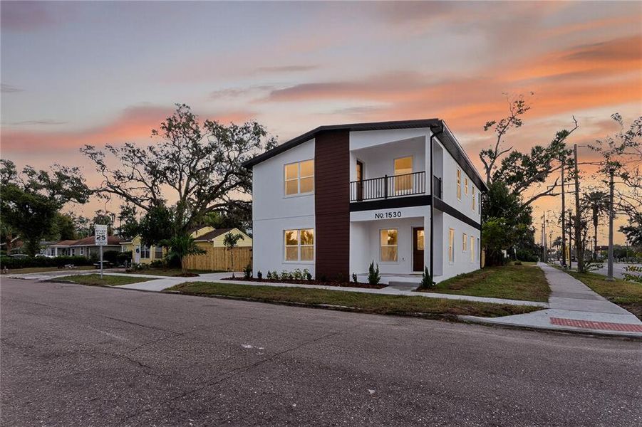 Front exterior of a new home in , St. Petersburg, FL, highlighting curb appeal (Image 1). Front exterior of a new home in , St. Petersburg, FL, highlighting curb appeal (Image 1).
