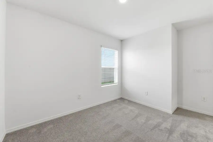 Spacious, unfurnished interior of a new home in Firethorn, Parrish (Image 22).