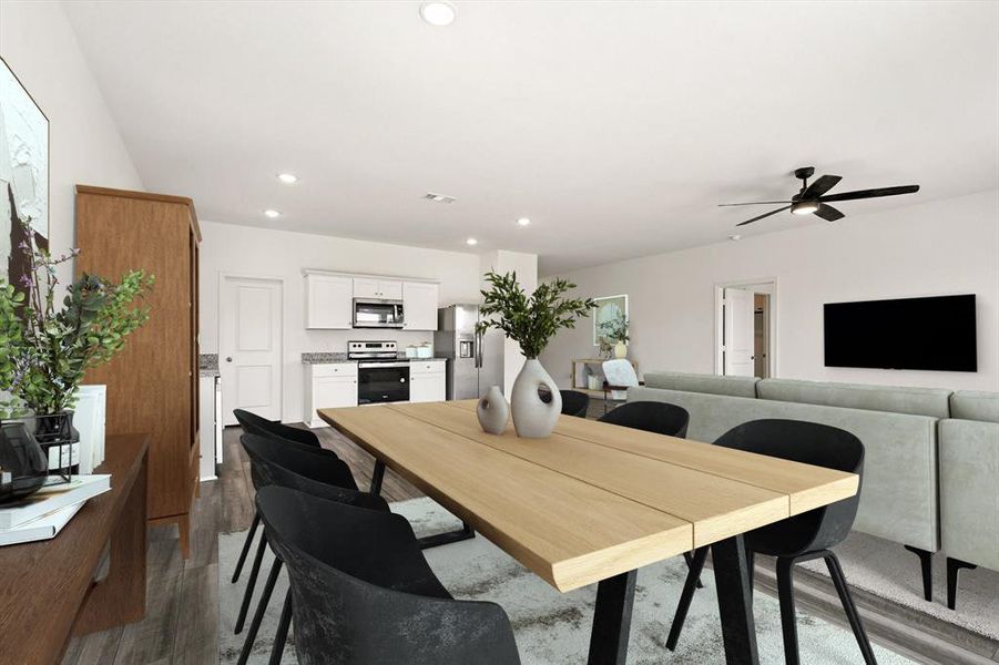 Virtually staged dining area featuring dark wood-style flooring, recessed lighting, and ceiling fan Virtually staged dining area featuring dark wood-style flooring, recessed lighting, and ceiling fan
