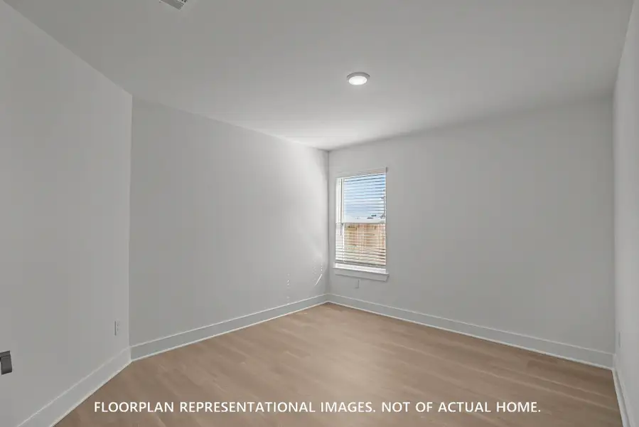 Spacious, unfurnished interior of a new home in Pinewood at Grand Texas, New Caney (Image 12).