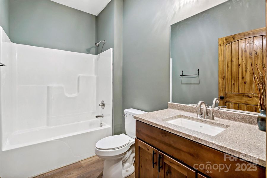 Guest bathroom on main level Guest bathroom on main level