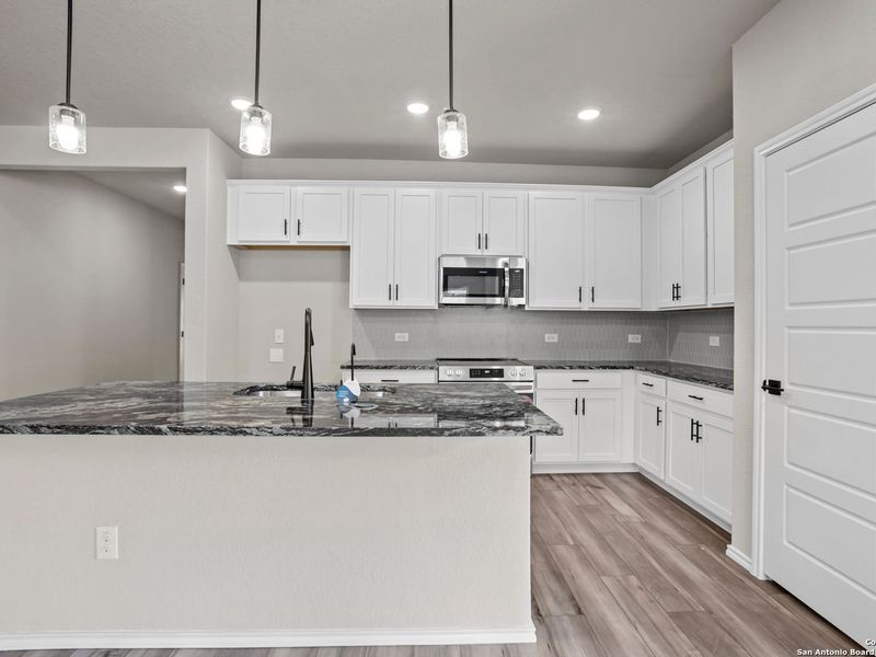 Furnished interior view inside a new home in Royal Crest, San Antonio (Image 6).