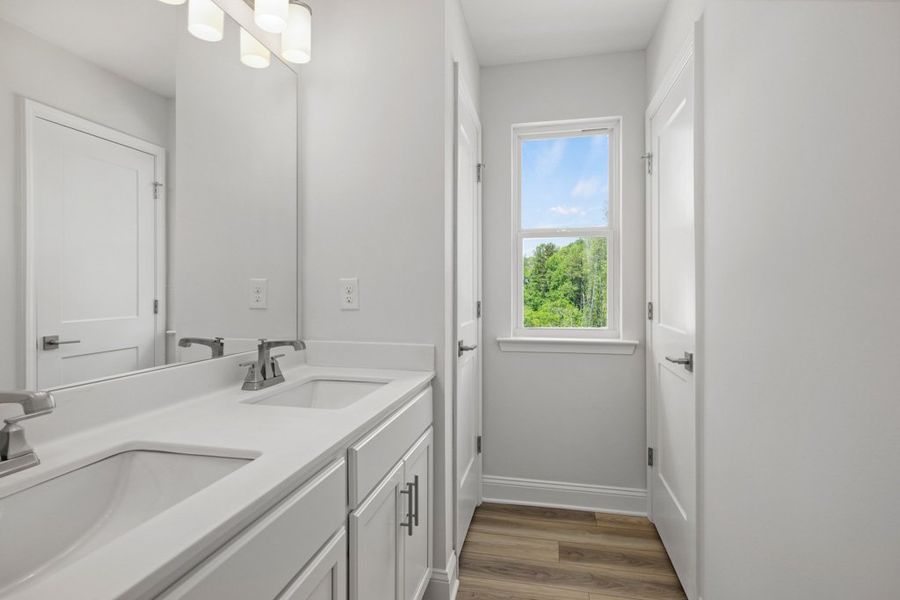 Representative furnished interior of a home built from the Charlton by UnionMain Homes in Austin Springs, Bethlehem (Image 8).