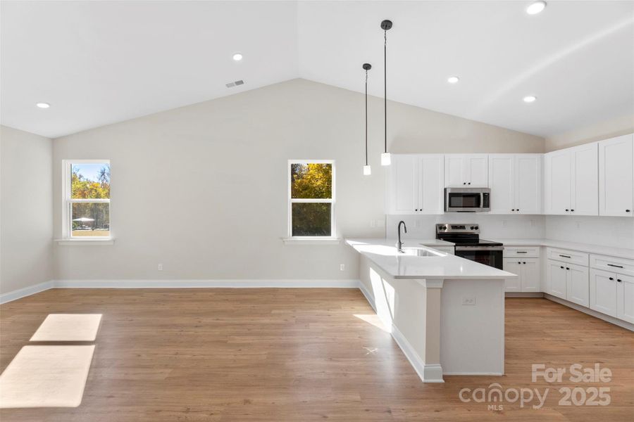 Furnished interior view inside a new home in , Monroe (Image 6).