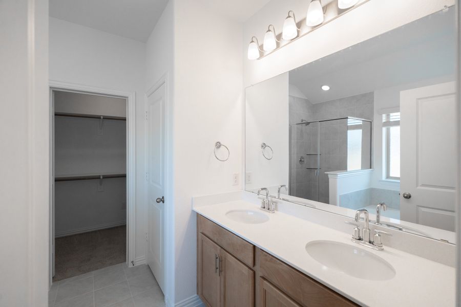 Furnished interior view inside a new home in Lake Pointe, Little Elm (Image 9).