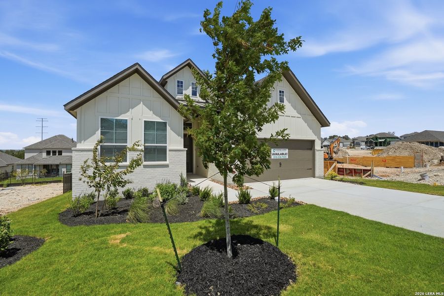Front exterior of a new home in Esperanza 50's, Boerne, TX, highlighting curb appeal (Image 26).
