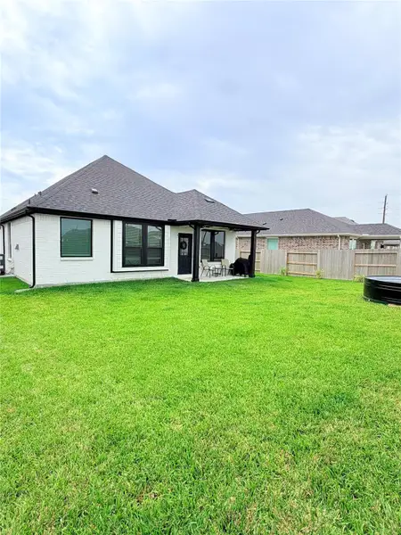 Exterior details and patio area of a home in , Richmond (Image 3).