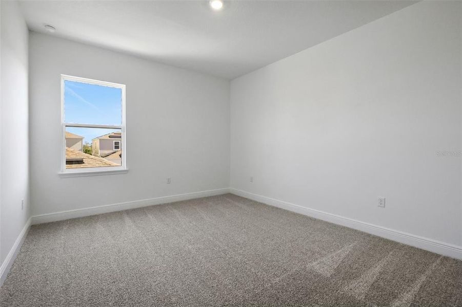 Spacious, unfurnished interior of a new home in Serenade at Ovation, Winter Garden (Image 32). Spacious, unfurnished interior of a new home in Serenade at Ovation, Winter Garden (Image 32).