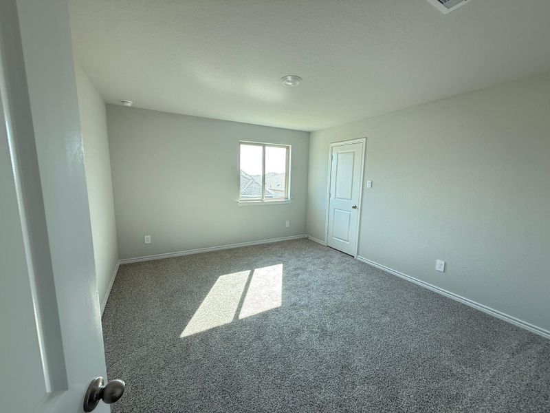 Spacious, unfurnished interior of a new home in Southern Pointe, College Station (Image 18).