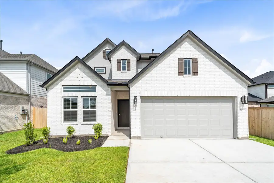 Front exterior of a new home in Morton Creek Ranch, Katy, TX, highlighting curb appeal (Image 1). Front exterior of a new home in Morton Creek Ranch, Katy, TX, highlighting curb appeal (Image 1).