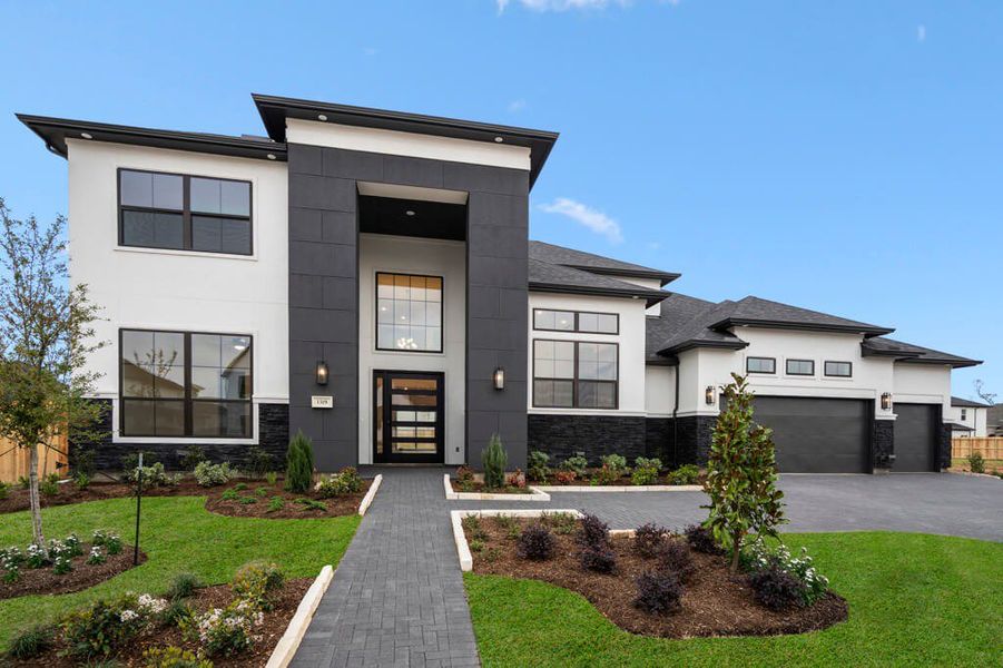 Representative exterior photo of a completed home built from the Balmoral 5580 by J. Patrick Homes in Briarley, Montgomery, TX (Image 12). Representative exterior photo of a completed home built from the Balmoral 5580 by J. Patrick Homes in Briarley, Montgomery, TX (Image 12).