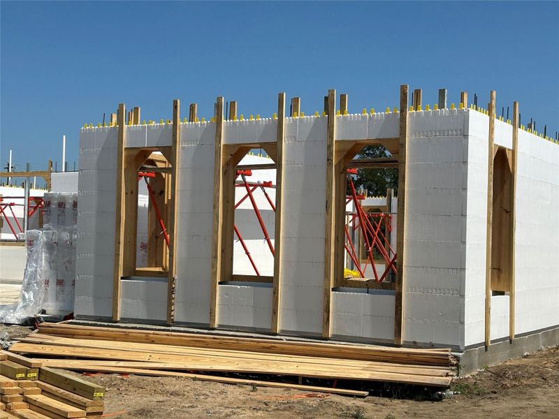Photos taken during the construction process displays Insulated Concrete Forms.